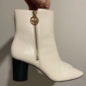 White leather coach boots